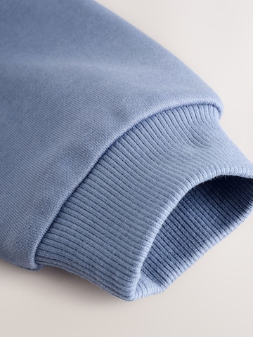 Set Next en bleu