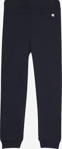 Champion Authentic Athletic Apparel - Tapered Pantalón deportivo en azul: frente