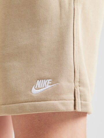 Nike Sportswear Широка кройка Панталон 'CLUB' в бежово