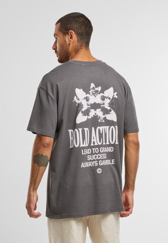 T-Shirt 'Actions' Mister Tee en gris