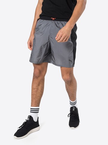 PUMA Regular Workout Pants in Grey: front