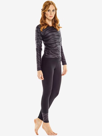 Winshape Skinny Spodnie sportowe 'HWL116C' w kolorze czarny