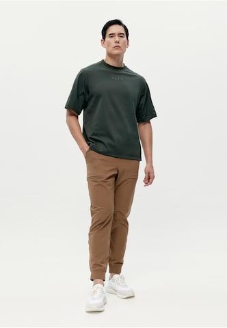 Born Living Yoga Sports top 'Tarn' in Green