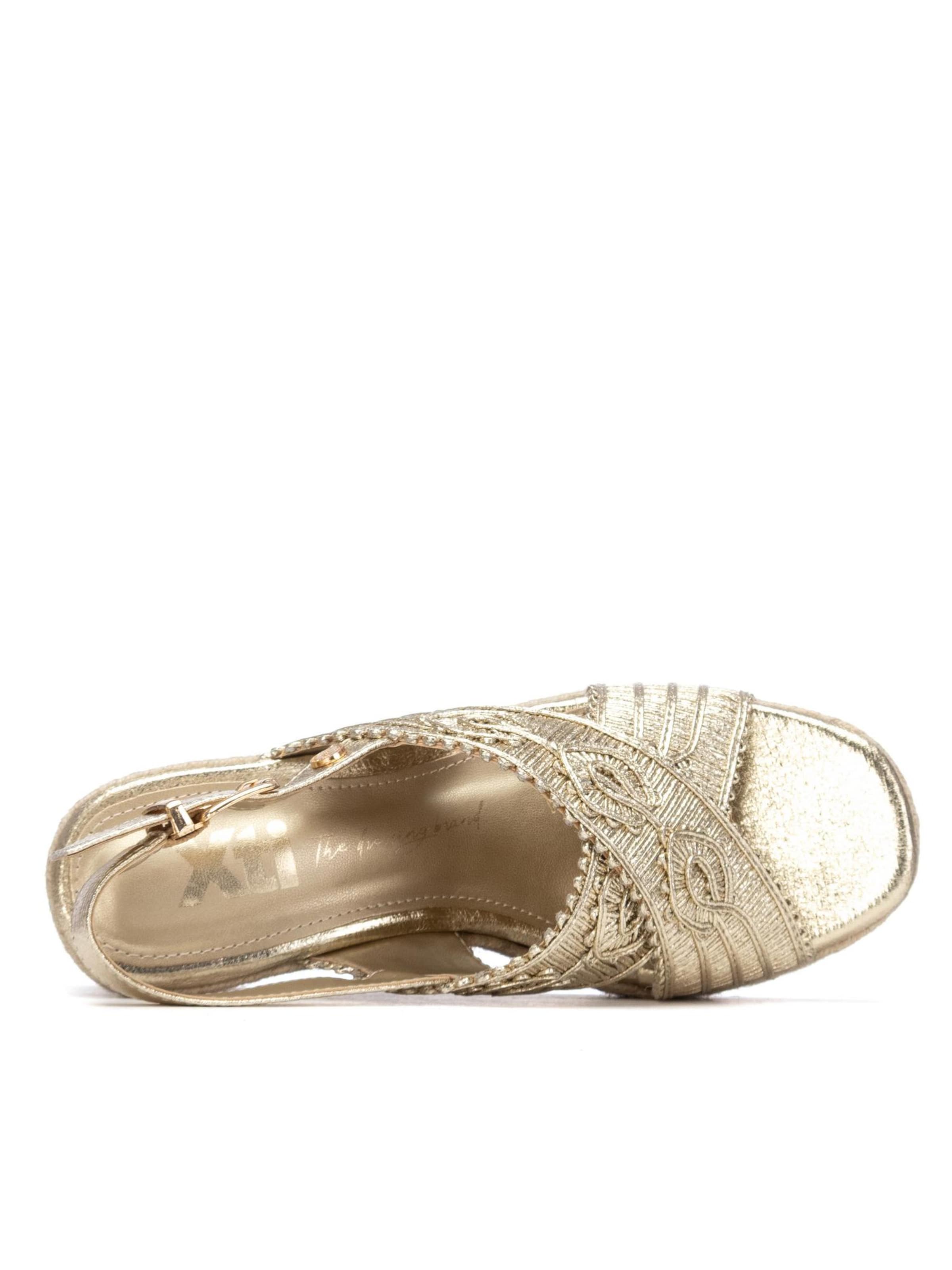 Xti - Sandalias en oro