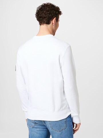 Bluză de molton de la Calvin Klein Jeans pe alb