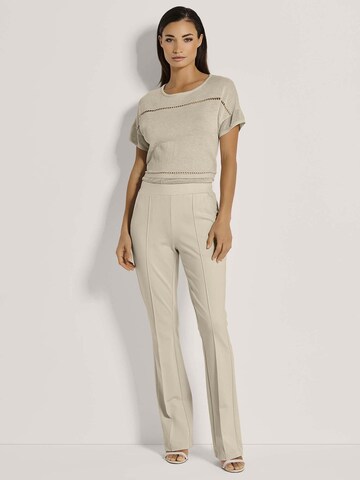 MADELEINE Flared Broek in Beige