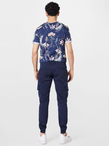 Effilé Pantalon cargo Urban Classics en bleu