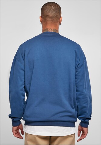 Sweat-shirt Urban Classics en bleu