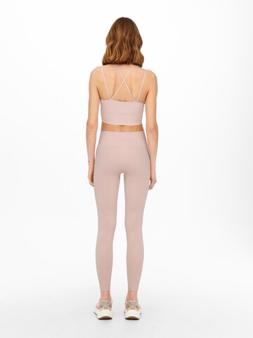 Skinny Pantalon de sport ONLY PLAY en rose