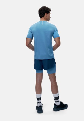 T-Shirt fonctionnel 'Tadjura' Born Living Yoga en bleu