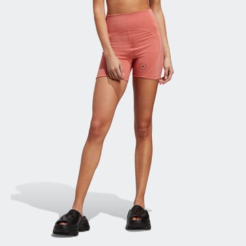 Skinny Pantalon de sport 'TrueStrength' ADIDAS BY STELLA MCCARTNEY en orange : devant