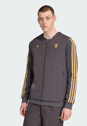 ADIDAS ORIGINALS Bodywarmer 'Manchester United Terrace Icons' in Zwart: voorkant