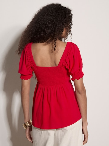 Chemisier ' ' Apricot en rouge