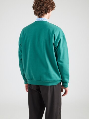 Kaotiko Sweatshirt 'CREW POCKET LOOK INSIDE' in Green