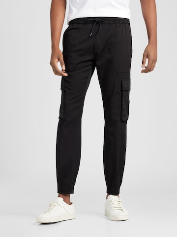 Calvin Klein Jeans Tapered Cargo Pants in Black: front