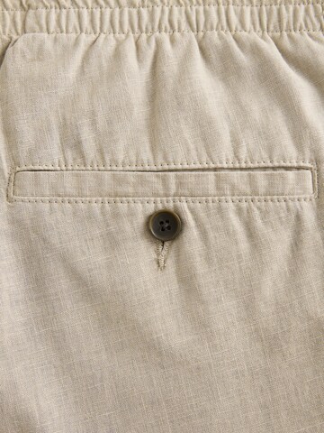 regular Pantaloni di Next in beige
