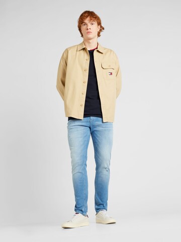 Tommy Jeans Übergangsjacke 'VARSITY HERO' in Beige