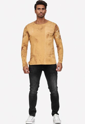 Rusty Neal Langarmshirt mit plakativem Front & Back Print in Braun