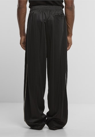 Regular Pantalon Karl Kani en noir
