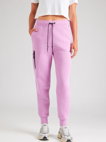 Tapered Pantaloni 'TCH FLC' di Nike Sportswear in rosa: frontale