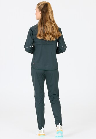ENDURANCE Slim fit Sports trousers 'Eluna' in Green