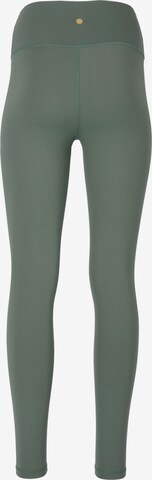 Athlecia Skinny Sportbroek 'Gaby' in Groen