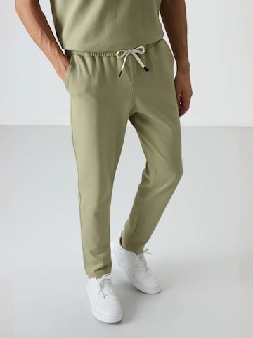 Tommy Life Joggingpak in Groen