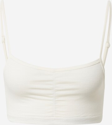 Reggiseno sportivo di super.natural in bianco: frontale