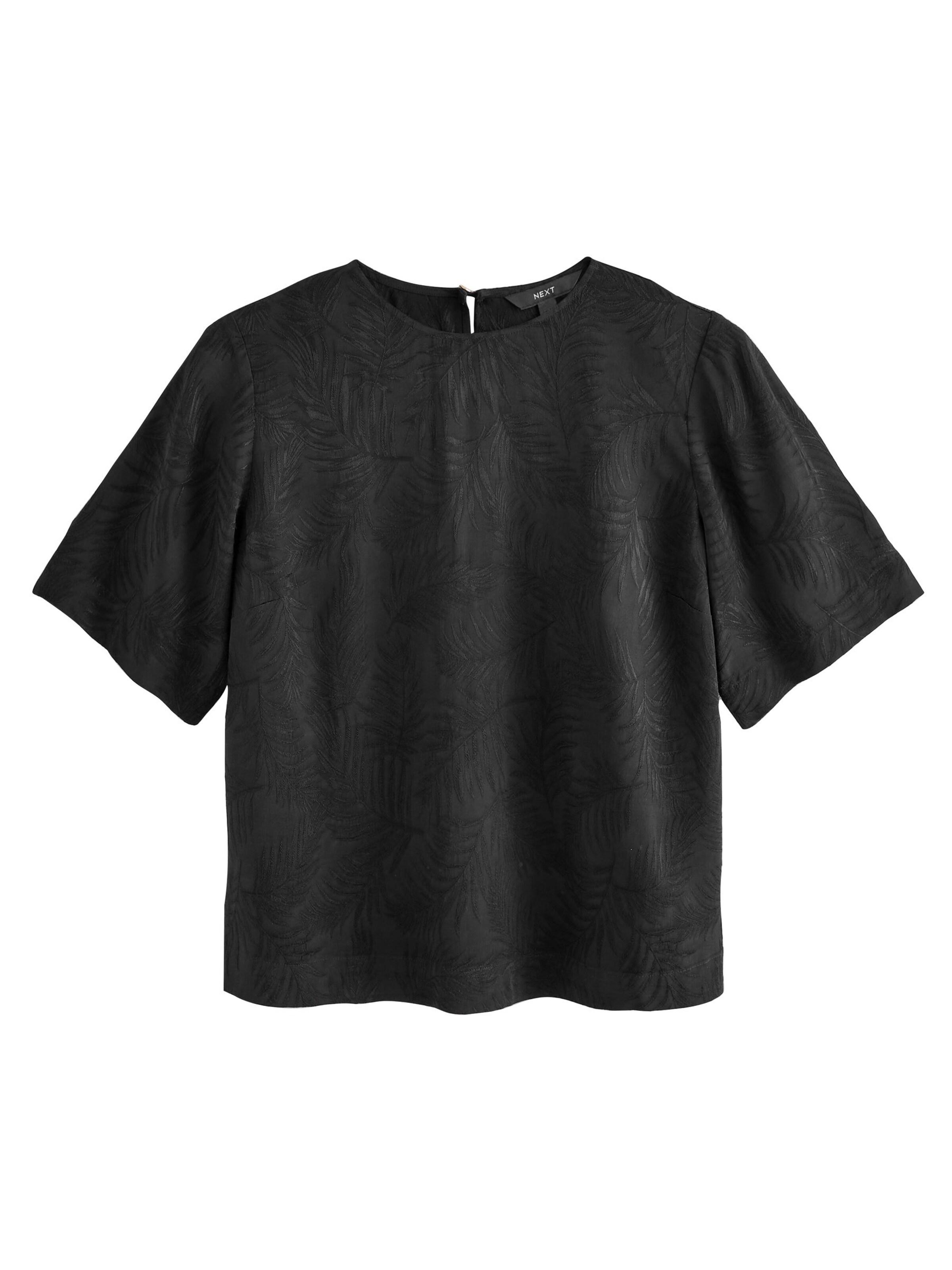 Next Blus i svart: framsida