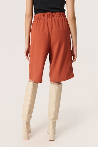 SOAKED IN LUXURY Loose fit Pants 'Shirley' in Orange