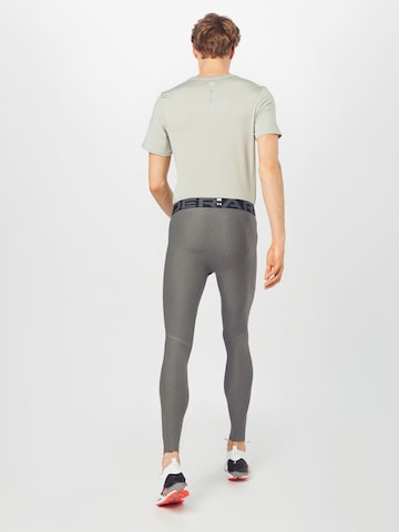 UNDER ARMOUR Skinny Sporthose in Grau