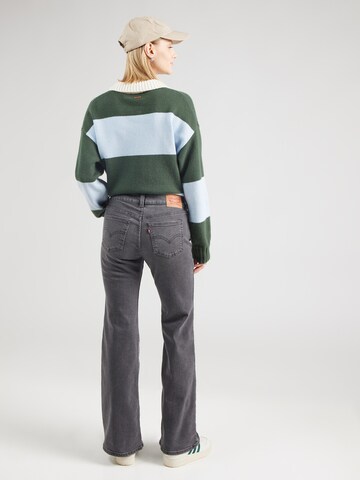 LEVI'S ® Flared Jeans 'SUPERLOW' in Grau