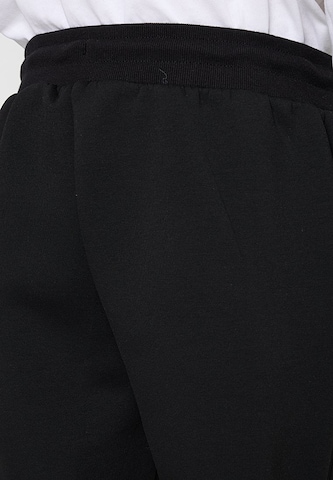 ELLESSE - Tapered Pantalón 'Bormia 2' en negro