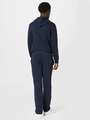 Champion Authentic Athletic Apparel Tapered Sportbyxa i blå