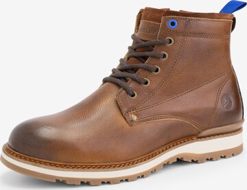 Travelin Lace-Up Boots in Brown: front