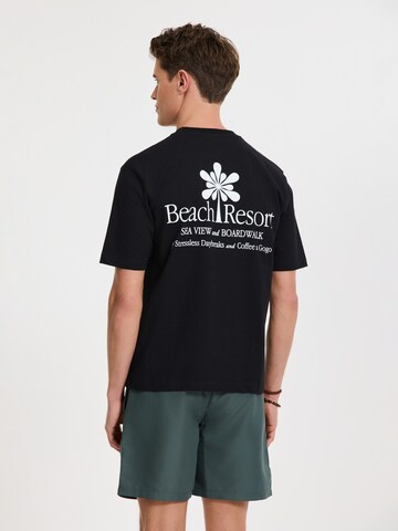 Shiwi Shirt 'Finn Suncation' in Black: front