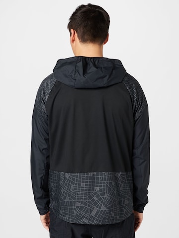 NIKE Sportjacke in Schwarz