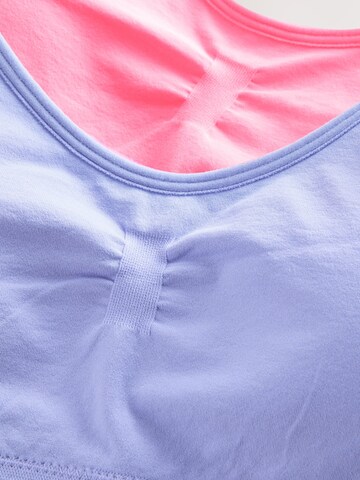 Haut Next en bleu