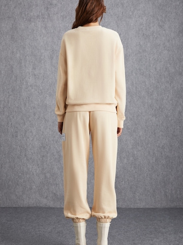 Grimelange - Sudadera en beige