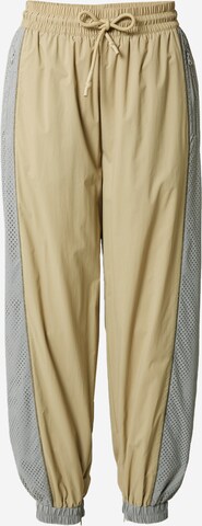 LACOSTE Tapered Sports trousers in Beige: front