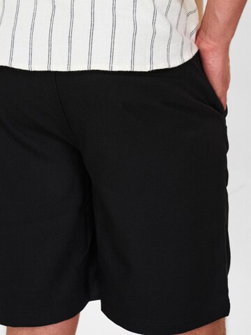 Dxnmxrk Regular Hose 'DXCharley' in Schwarz