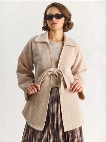 Cardigan Bianco Lucci en beige