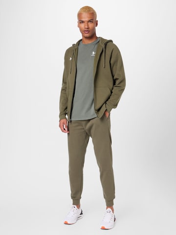 UNDER ARMOUR Tapered Sporthose in Grün