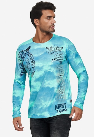 Rusty Neal Cooles Longsleeve mit angesagtem Allover-Print in Grün: predná strana