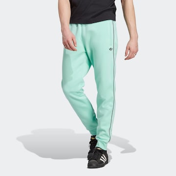 ADIDAS ORIGINALS Tapered Pants 'Adicolor Seasonal Archive' in Green: front