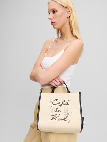 Karl Lagerfeld Shoppingväska 'KL x Jorge Parra' i beige: framsida