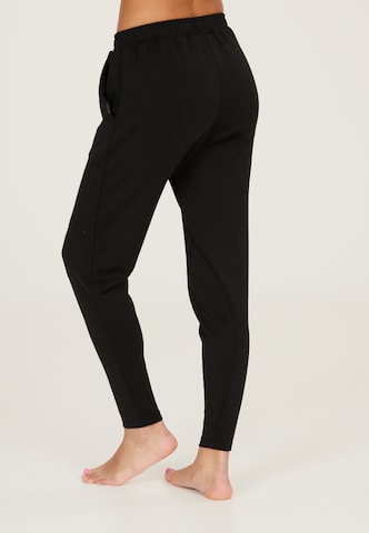 Athlecia Slim fit Outdoor trousers 'Aoma' in Black