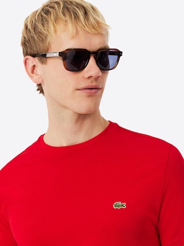 Maglietta di LACOSTE in rosso