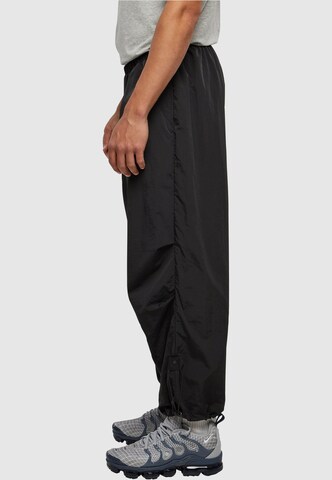 Tapered Pantaloni di Urban Classics in nero