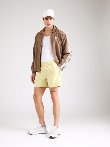 regular Pantaloni 'Adicolor Classics Sprinter' di ADIDAS ORIGINALS in giallo